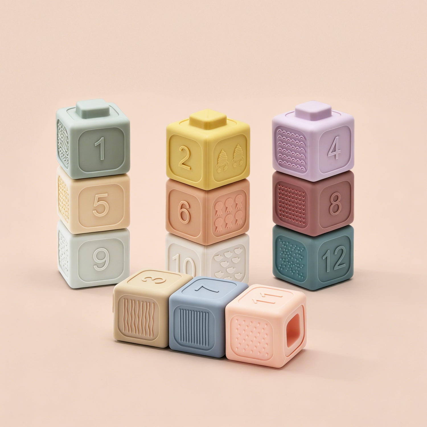 Stack of colorful number blocks on a beige background