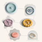 Set of colorful silicone mold shapes on a white background 