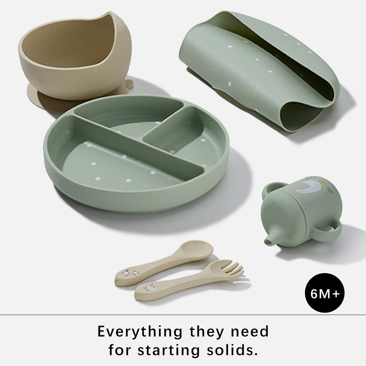 A 6-piece baby feeding set for starting solids, including a divided plate, suction cup bowl, silicone cover, sippy cup, two utensils, and a text badge reading 'Everything they need for starting solids.' on a white background.