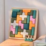 Colorful wooden puzzle on a wooden surface with a neutral background 
