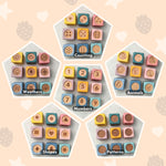 Set of colorful educational wooden blocks with different categories on a light pink background.