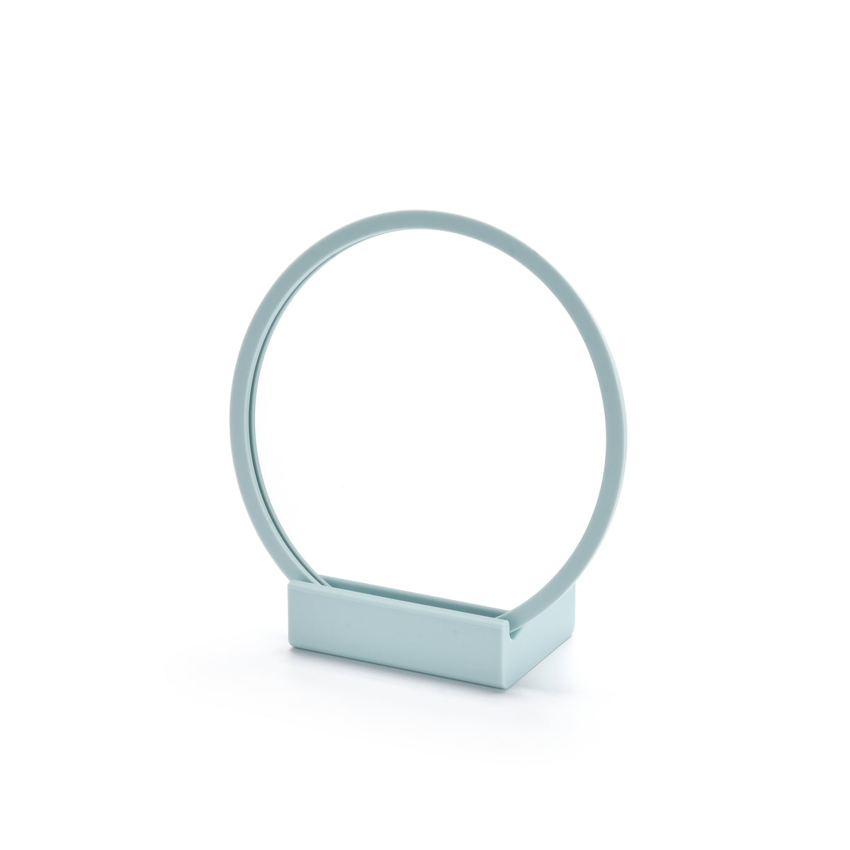 Metallic ring-shaped object on a white background 