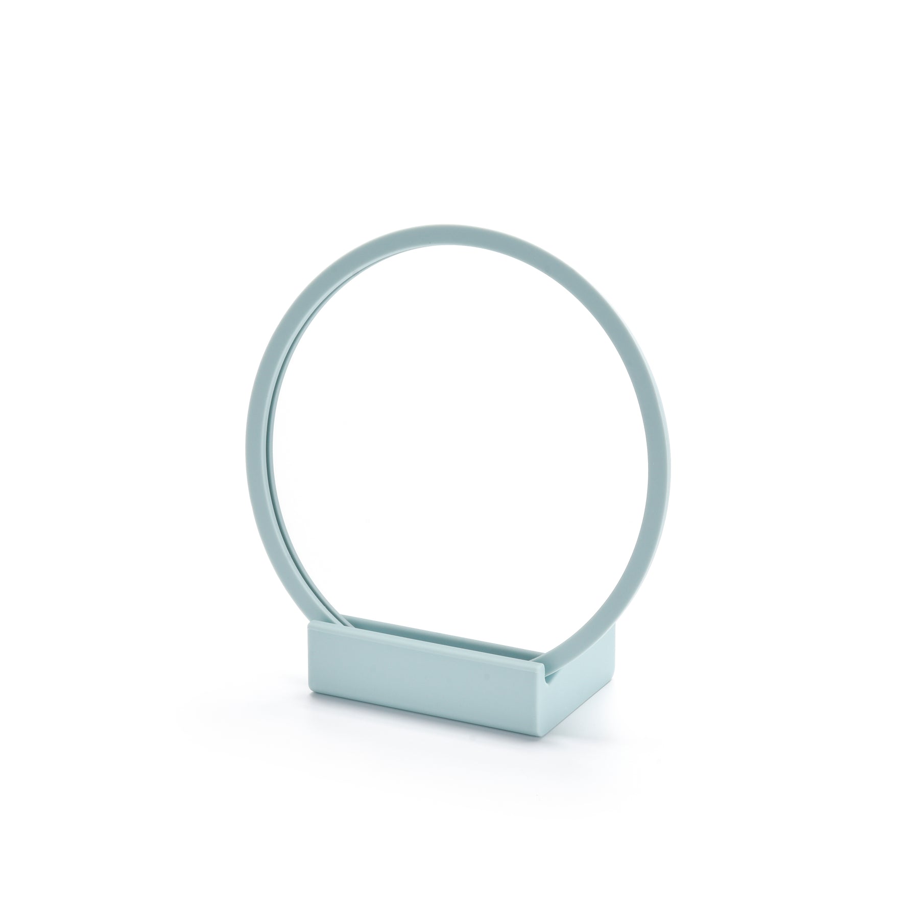 Metallic ring-shaped object on a white background 