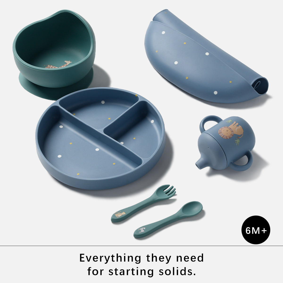 A 6-month+ baby feeding set with a heart-shaped bowl, divided plate, rolled lid, sippy cup, fork, and spoon in muted teal and dusty blue with small animal and star illustrations, shown on a light gray background with the text 'Everything they need for starting solids.'.