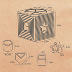 A line-drawn dimension diagram on a tan paper-like background showing a small box-like item with star and square cutouts, plus several smaller component shapes with measurements in inches.